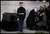 Vice President Dick Cheney and Mrs. Lynne Cheney salute as the casket of former President Gerald R. Ford is carried by a military honor guard during interment ceremonies on the grounds of the Gerald R. Ford Presidential Museum in Grand Rapids, Mich., Wednesday, January 3, 2007.