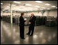 Marking the first day of mass production of economic stimulus checks, Vice President Dick Cheney tours the Philadelphia Regional Financial Center with Director Betty Belinsky, Thursday, May 8, 2008, in Philadelphia. White House photo by David Bohrer