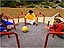 Students sitting on a merry-go-round