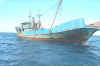 A blue, 140 foot long line fishing vessel.