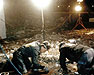 ATF agents examining debris