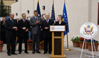 Charge dAffaires Tina Kaidanow, U.S. Marines, and others at the ceremony to unveil the U.S. Embassy Pristina plaque. [U.S. Embassy Pristina photo]