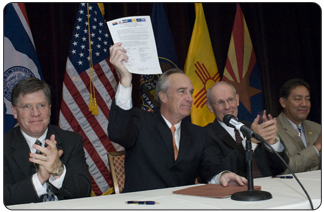 “This is the most important agreement among the seven basin states since the original Colorado River Compact of 1922,” said Kempthorne, noting that the decision memorializes “a remarkable consensus” not only to solve current problems but also to prepare ahead of time for future droughts or surpluses rather than resorting to disruptive litigation. Pictured left to right, Secretary Kempthorne; Dennis J. Strong, Director, Utah Division of Water Resources; Estevan R. Lopez, Director, Interstate Stream Commission, State of New Mexico. [Photo Credit: Andy Pernick/Reclamation]