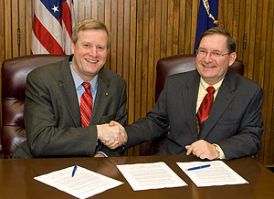 Edwin G. Foulke, Jr., Assistant Secretary, USDOL-OSHA, and Bill Weaver, President, Kitchen Cabinet Manufacturers Association, after signing a national Alliance agreement on March 20, 2008.