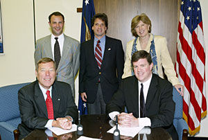(sitting L-R) Scott Connor, Vice President, Products and Health and Safety Services, American Red Cross, Jonathan L. Snare, OSHA’s then-Acting Assistant Secretary, (Standing L-R) American Red Cross representatives, Noah Simon, Steve Rieve and Jean Erdtmann after signing national Alliance on May 19, 2005.