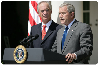 As U.S. Interior Secretary Dirk Kempthorne looks on, President George W. Bush delivers a statement on energy Wednesday, June 18, 2008, in the Rose Garden of the White House.  [White House photo by Luke Sharrett]
