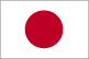 Flag of Japan is white with a large red disk in the center.
