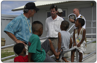 It was during his June 2007 official visit to the U.S. insular areas that Secretary Kempthorne first called for a plan to help island leaders expand and improve public health services for those communities. Secretary Kempthorne is pictured with children from the Marshall Islands outside Ebeye Hospital.