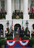 President George W. Bush delivers his remarks welcoming Prime Minister Silvio Berlusconi of Italy upon his arrival Monday, Oct. 13, 2008, during a South Lawn Arrival Ceremony for Prime Minister Silvio Berlusconi of Italy at the White House. White House photo by Chris Greenberg