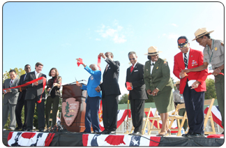 At the grand opening of Tuskegee Airmen National Historic Site, Deputy Secretary of the Interior Lynn Scarlett (second from right) joined park superintendent Catherine Light, Alabama Governor Bob Riley, and Tuskegee University President Dr. Benjamin F. Payton in honoring the many Tuskegee veterans whose courage during World War II made history back home. 