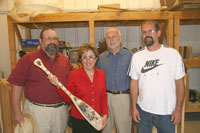 Rep. Gary Sherman, Secretary Gassman, DVR Counselor Jerry Jorgenson, and Tim Zwetow, owner of Voyageur Unlimited, LLC.