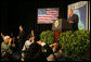 The media swarms President George W. Bush Saturday, Nov. 6, 2005, as he speaks at Blue Tree Stars Hall in Brasilia, Brazil, prior to his departure for Panama. White House photo by Krisanne Johnson