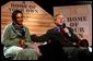 President George W. Bush speaks during a discussion about homeownership with first-time homebuyer Pearl Cerdan in Ardmore, Pennsylvania. Monday, March 15, 2004.  White House photo by Tina Hager