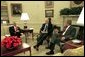 President George W. Bush meets with Senator John Danforth, the President's Special Envoy to the Sudan, center, and Secretary of State Colin Powell in the Oval Office Wednesday, May 21, 2003.  White House photo by Susan Sterner