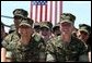 Marines react to remarks by President George W. Bush to military personnel and their families at Marine Air Corps Station Miramar near San Diego, CA on August 14, 2003.  White House photo by Paul Morse