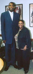 Asst. Sec. Frazer with Dikembe Mutombo at State Department, May 25, 2006