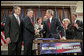 President George W. Bush shakes hands with Congressman Peter King, R-N.Y., chairman of the Homeland Security Committee, after signing H.R. 4954, the SAFE Port Act, in the Dwight D. Eisenhower Executive Office Building Friday, Oct. 13, 2006. Also pictured from left are Sen. Bill Frist, R-Tenn.; Sen. Susan Collins, R-Maine; Sen. Robert Bennett, R-Utah; Sen. Patty Murray, D-Wash.; and Sen. Norm Coleman, R-Minn.  White House photo by Paul Morse