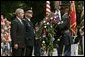 President George. W. Bush stands with U.S. Army Major General Galen Jackman as he lays a wreath at the Tomb of the Unknown Soldier at the Arlington National Cemetery on Memorial Day May 30, 2005.  White House photo by Krisanne Johnson