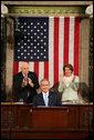 President George W. Bush receives applause while delivering the State of the Union address at the U.S. Capitol, Tuesday, Jan. 23, 2007. Also pictured are Vice President Dick Cheney and Speaker of the House Nancy Pelosi. White House photo by David Bohrer