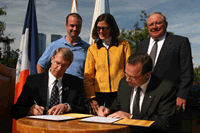 Signing the urban bird treaty are, from left, in front row, Marvin Moriarty, Northeast Regional Director, U.S. Fish and Wildlife Service; Adrian Benepe, Commissioner, New York City Department of Parks & Recreation; in back row, Glenn Phillips, Executive Director New York City Audubon; Deputy Interior Secretary Lynn Scarlett; and Al Caccese, Executive Director Audubon New York. 