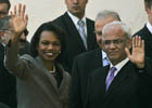Secretary Rice waves to crowd with Palestinian Chief Negotiator Saeb Erekat. c AP Photo