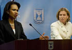 Secretary Rice and Israeli Foreign Minister Tzipi Livni standing at podiums during press conference. c AP photo