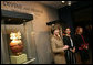 Mrs. Laura Bush, accompanied by Mrs. Marta Sahagun de Fox and Mrs. Eliane Karp de Toledo, talks with reporters following her tour of the Divine and Human: Women in Mexico and Peru Exhibit, Tuesday, March 14, 2006 at The National Museum of Women in the Arts in Washington. White House photo by Shealah Craighead