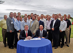 (First row L-R) Edwin G. Foulke, Jr., Assistant Secretary, USDOL-OSHA and Chris Peck, Chairman, National Construction Safety Executives (NCSE) are joined by NCSE’s members for the signing of a national Alliance agreement on September 20, 2007
