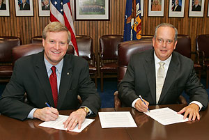 (L-R) OSHA's Assistant Secretary, Edwin G. Foulke, Jr. and CMAA's Chief Executive Officer, James B. Singerling renew a national Alliance agreement on October 17, 2007