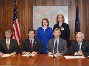 Front row L-R: Ben Cooper, Graphic Arts Technical Foundation/Printing Industries of America; OSHA's then-Assistant Secretary, John Henshaw; Michael Robertson, Specialty Graphic Imaging Association; Richard H. Dunnington, Gravure Association of America, Inc. Back row L-R: Danielle Waterfield, Specialty Graphic Imaging Association; Marci Kinter, Specialty Graphic Imaging Association