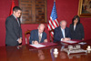 P. Michael McKinley, U.S. Ambassador to Peru, and Ambassador Jose Garcia Belaunde, Minister for Foreign Affairs of the Government of Peru sign MOA establishing RTC in Lima. [State Dept. photo]