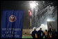 Mrs. Bush, joined by, from left, Dan Formanowicz, Chairman of the Faculty Senate, James Spaniolo, President, UT at Arlington, Robert Estrada, Member, UT System Board of Regents, Dana Dunn, University Provost and Vice President for Academic Affairs, watch fireworks at the conclusion of the 2007 Graduation Celebration event at The University of Texas at Arlington on Friday, May 11, 2007, in Arlington, Texas. During remarks that Mrs. Bush delivered, she said, “ Class of 2007, keep this commitment to others now that you’ve graduated. There are so many people who need your help. Continue your tradition of service to our nation.” White House photo by Shealah Craighead