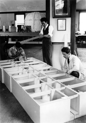 Morristown Laboratory museum technicians constructing model of Interior Museum, on a scale of one inch equals one foot, for use by the curators in planning the museum’s exhibits.