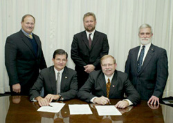 Seated, L-R OSHA's then-Assistant Secretary, John Henshaw, Mark Hansen, ASSE President; Standing, L-R ASSE's John Smith, Dave Heidorn, and Bob DiSiervo.