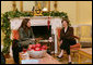 Mrs. Laura Bush and Mrs. Melinda Gates meet Thursday morning, Dec. 14, 2006, during a coffee hosted by Mrs. Bush at the White House, prior to their participation at the White House Summit on Malaria. White House photo by Shealah Craighead