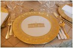 A White House table setting is seen, Wednesday, Nov. 2, 2005, in the White House State Dining Room, in preparation for the official dinner for the Prince of Wales and Duchess of Cornwall.