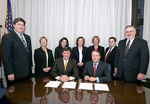 (seated L-R) OSHA’s then-Acting Assistant Secretary, Jonathan L. Snare and Jack Gerard, President and CEO of ACC and representatives from OSHA and ACC after the national Alliance signing November 14, 2005.