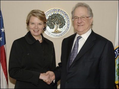 Secretary Spellings receives the final report of the Commission on the Future of Higher Education from Charles Miller, chairman of the commission.