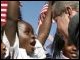 President Bush greets students at the Waldo C. Falkener Elementary School in Greensboro, North Carolina, where he delivered remarks on the No Child Left Behind Act.  White House photo by Paul Morse