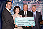 Secretary Chao, John Vogel (second from right), Dr. Jack Burke (right), Senator Rick Santorum (far left