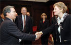 Colombian President Alvaro Uribe, left, shakes hands with Under Secretary Karen Hughes during a visit at the presidential palace in Bogota, Colombia Wednesday, March 15, 2006. [© AP/WWP]