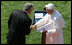 President George W. Bush shakes hands with Pope Benedict XVI following the Pope's remarks Wednesday, April 16, 2008, at the welcoming ceremony for the Pope on the South Lawn of the White House.