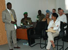 During her visit to Darfur in western Sudan, Secretary Rice is briefed by an AU official on the current situation.  USAID Administrator Andrew S. Natsios also attended.