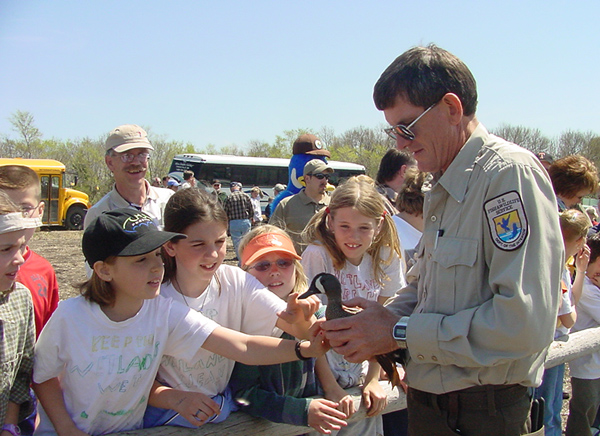 Kids learn about bird banding on refuge