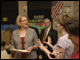 Secretary Spellings receives a book from Nikki Mayse's reading class at Fourth Street Elementary in Newport, Kentucky.