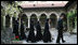 Mrs. Laura Bush and Sisters of the Stavropoleos Monastery in Bucharest, follow Dr. Petre Radu Guran as he leads them across the church courtyard Friday, April 4, 2008. In 2003, the U.S. Embassy donated $27,000 for the restoration of the courtyard under the auspices of a special U.S. Department of State program entitled, "Ambassador's Fund for Cultural Preservation".