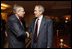 President George W. Bush greets NATO Secretary General Jaap de Hoop Scheffer Wednesday, April 2, 2008, at the JW Marriott Bucharest Grand Hotel in Bucharest, site of the 2008 NATO Summit.