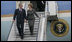 President George W. Bush and Mrs. Laura Bush steal a moment as they deplane Air Force One Wednesday, April 2, 2008, upon their return to Bucharest from the Romanian presidential retreat in Neptun, Romania.