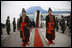 President George W. Bush and Mrs. Laura Bush wave as they prepare to depart Kyiv's Boryspil State International Airport Tuesday, April 1, 2008, after their daylong visit to Ukraine.