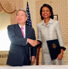 Secretary Rice during signing ceremony of Memorandum of Understanding on the WEST (Work, English Study, Travel) Program with His Excellency Yu Myung-hwan, Minister of Foreign Affairs and Trade of the Republic of Korea at the Waldorf Astoria. State Dept. photo/Michael Gross.
